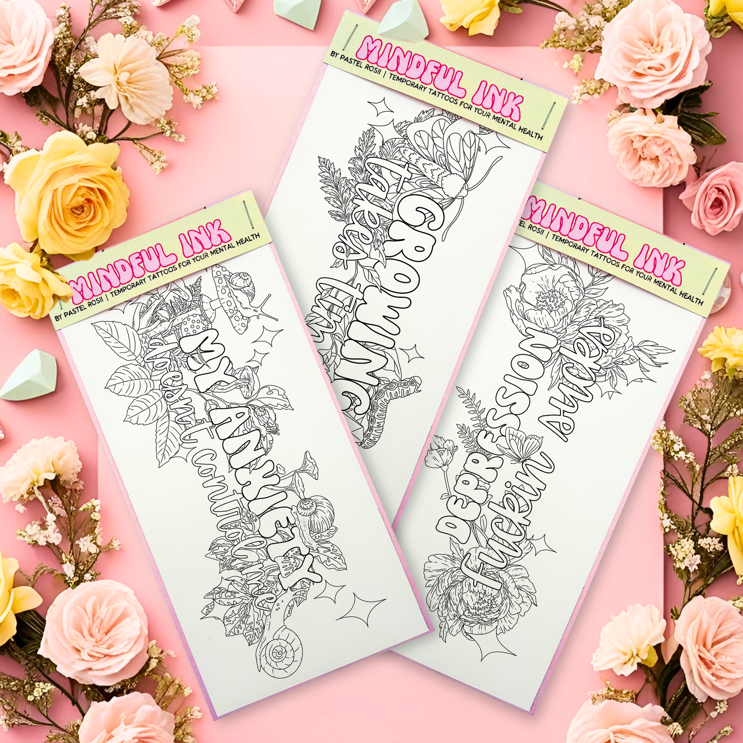 Three coloring tattoo pages with floral and motivational text on a pink background with flowers.