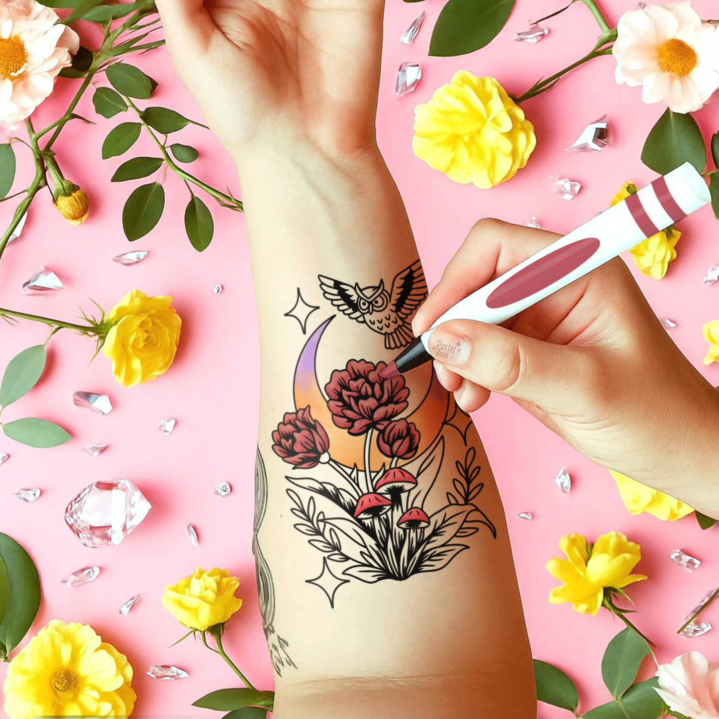 Person getting a floral tattoo on their arm with a pink background and flowers around.