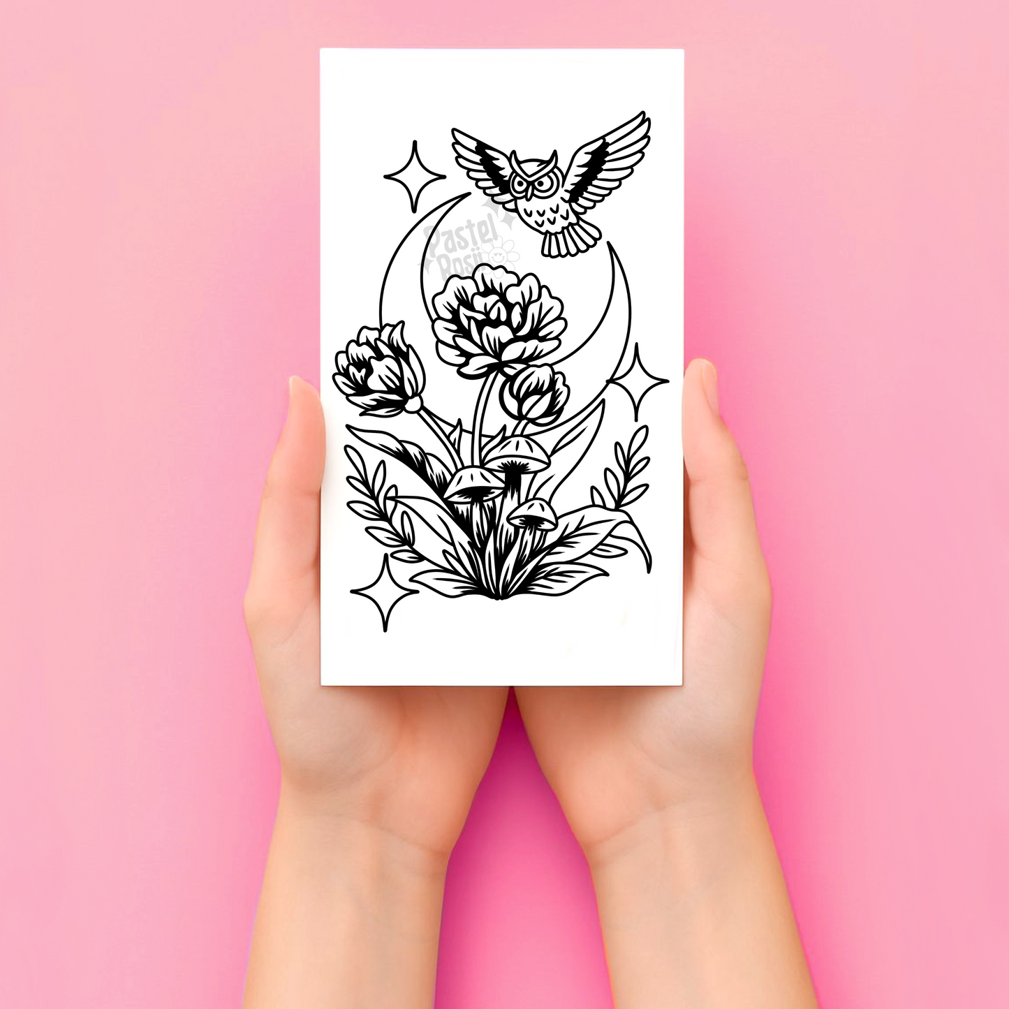 Hands holding a card with a black and white tattoo design of an owl and flowers on a pink background