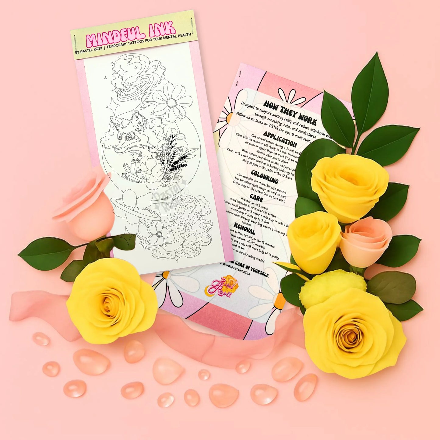 Mindful Ink tattoo kit with flowers on a pink background