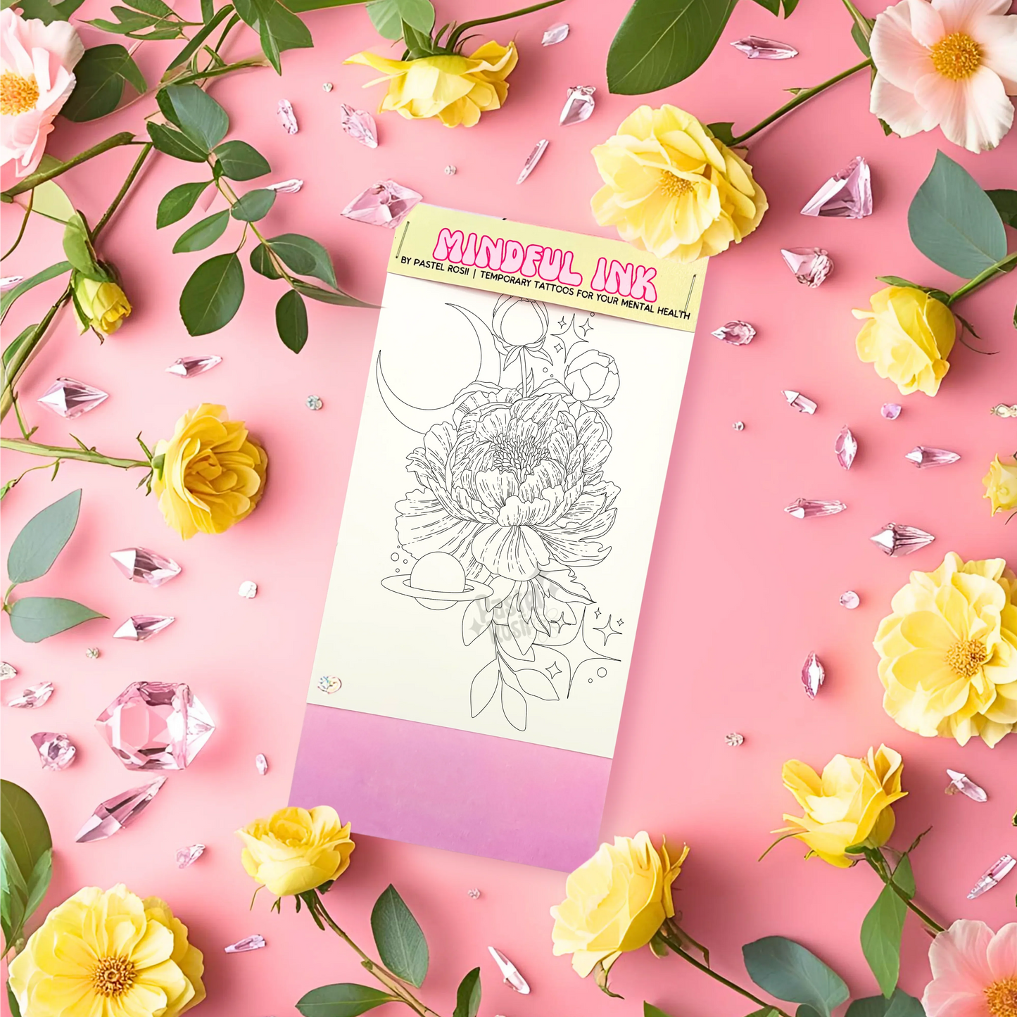 Temporary Tattoo with floral design on a pink background with flowers and crystals