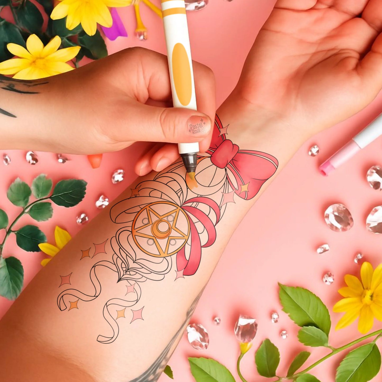 Person getting a temporary tattoo of a pink bow with a star on a pink background with flowers and leaves.
