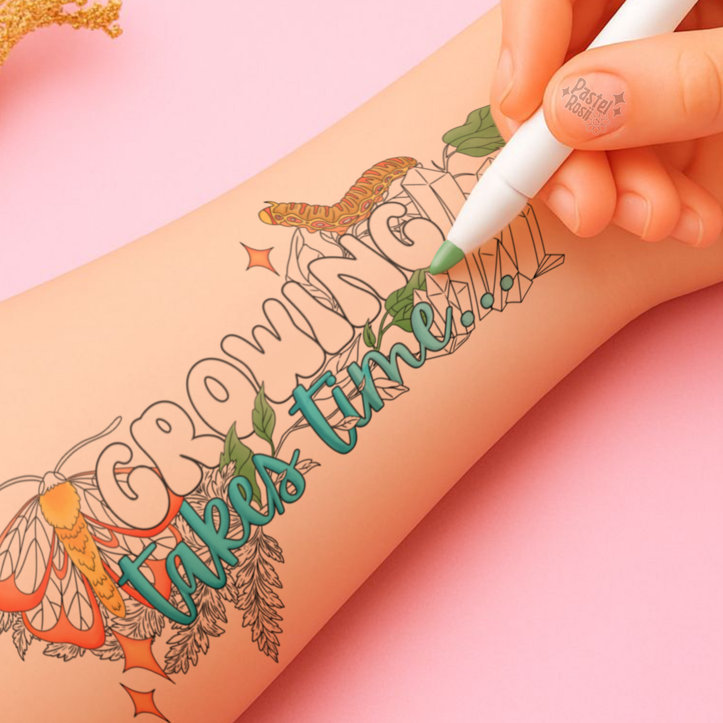 Hand with tattoo of 'Growing takes time' design on arm against pink background