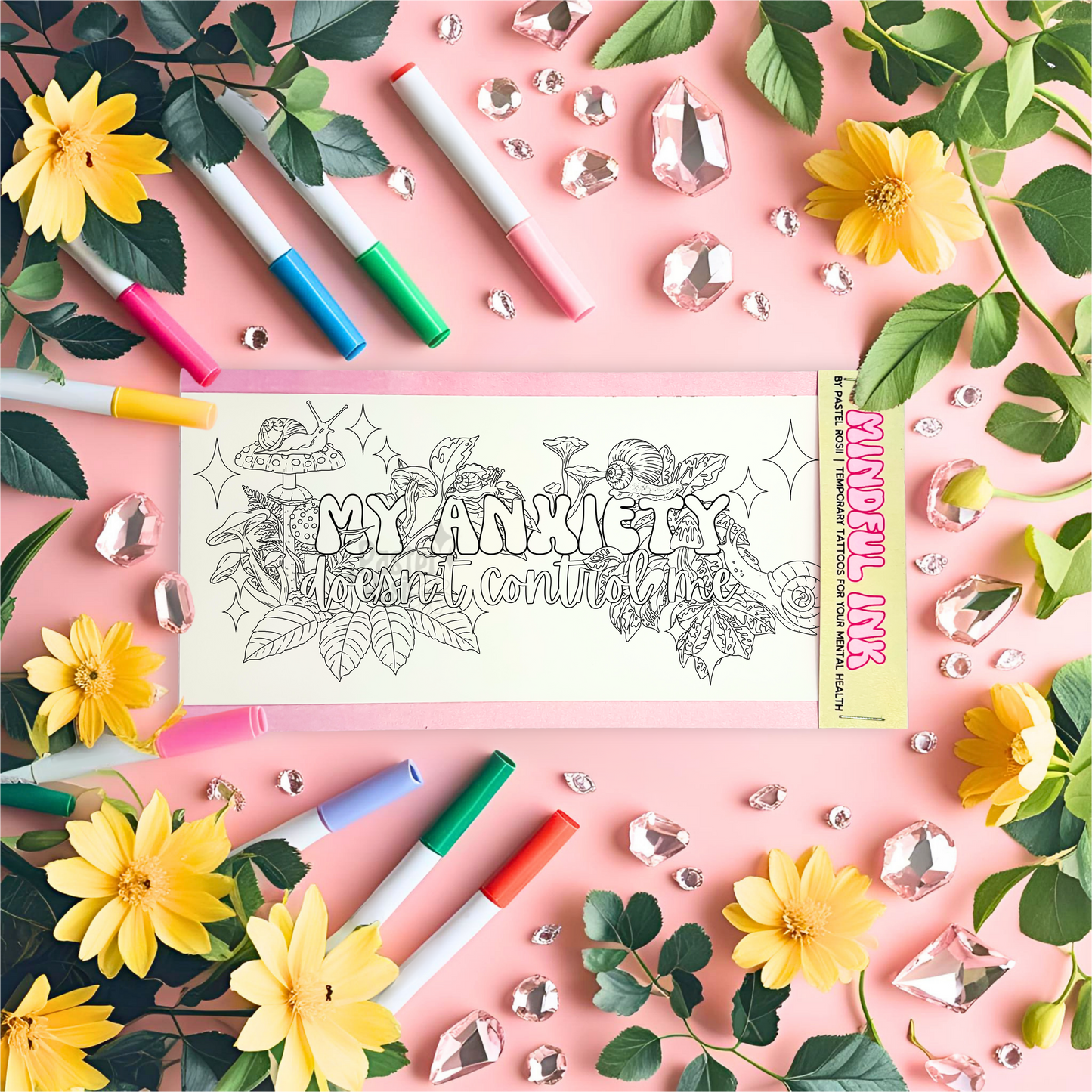 Temporary tattoo titled 'My Anxiety Doesn't Control Me' with markers and flowers on a pink background.