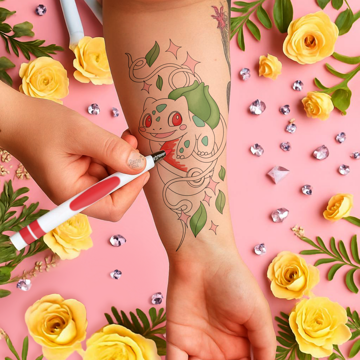 Person getting a tattoo of a cartoon character surrounded by yellow flowers and green leaves on a pink background.