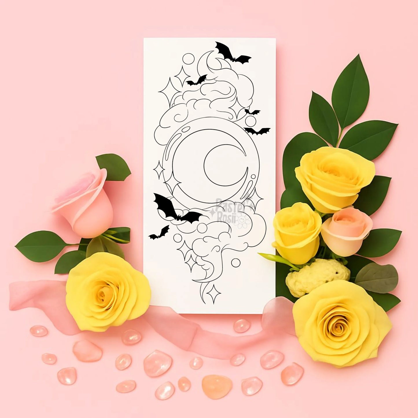 Temporary tattoo with bats and moon surrounded by yellow and pink roses on a pink background