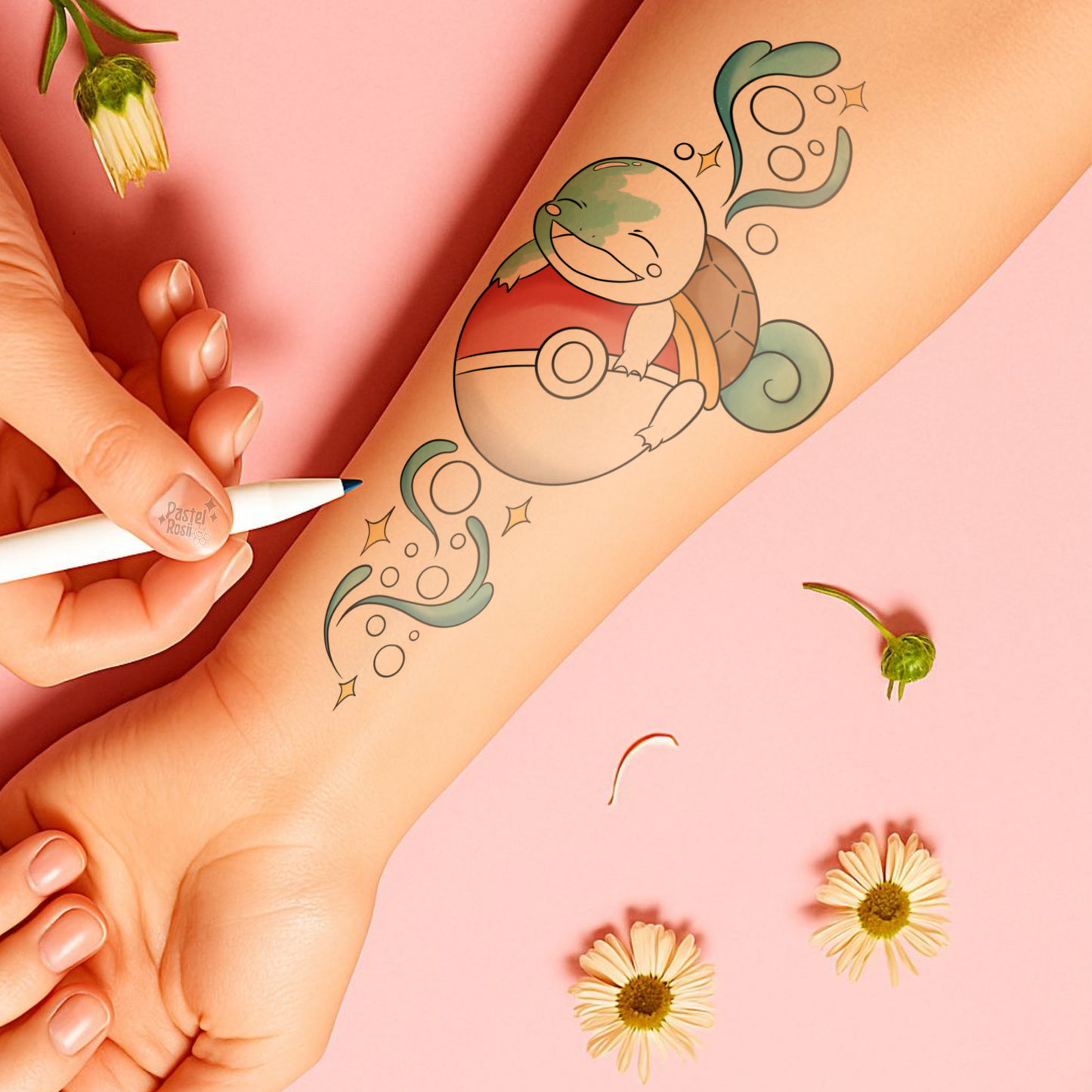 Tattoo design being drawn on a person's arm with a pen, surrounded by flowers on a pink background.