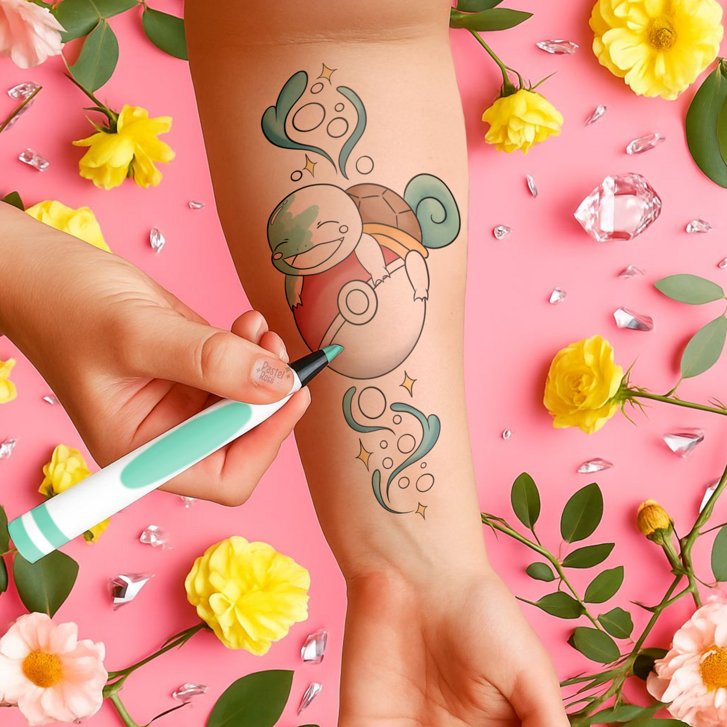 Tattoo design being drawn on a person's arm with flowers and decorative elements in the background