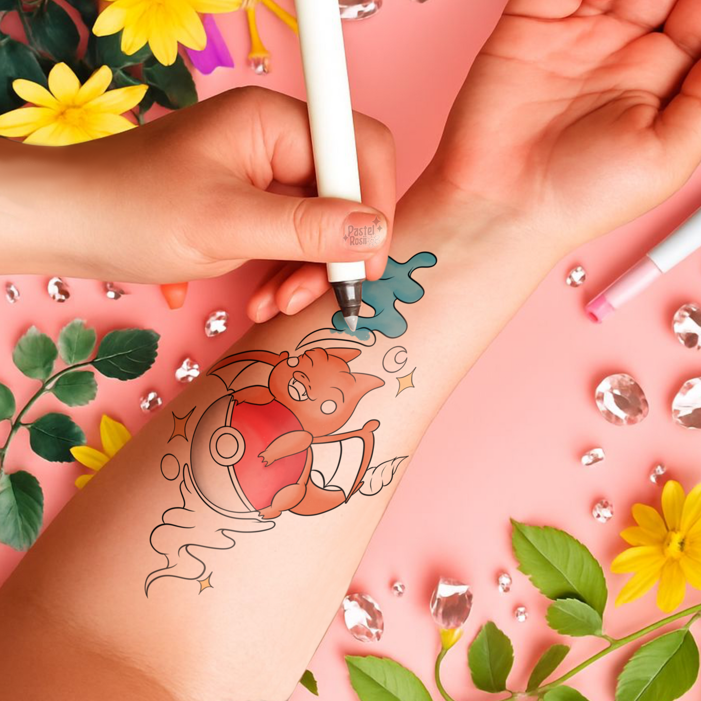 Temporary tattoo of a dragon design being applied to a person's arm with a pink floral background.