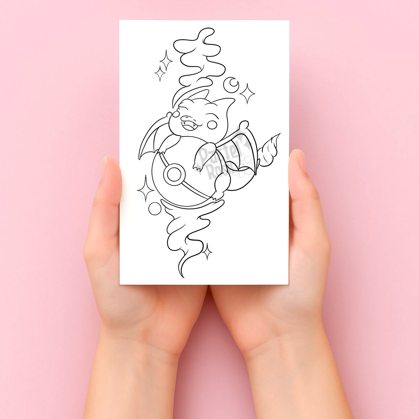 Hands holding a coloring temporary tattoo page with a dragon design on a pink background