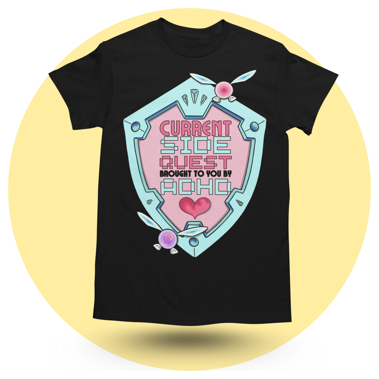 Black t-shirt featuring a colourful shield design that reads "Current Side Quest Brought to you by ADHD." Fairy elements adorn the shield.