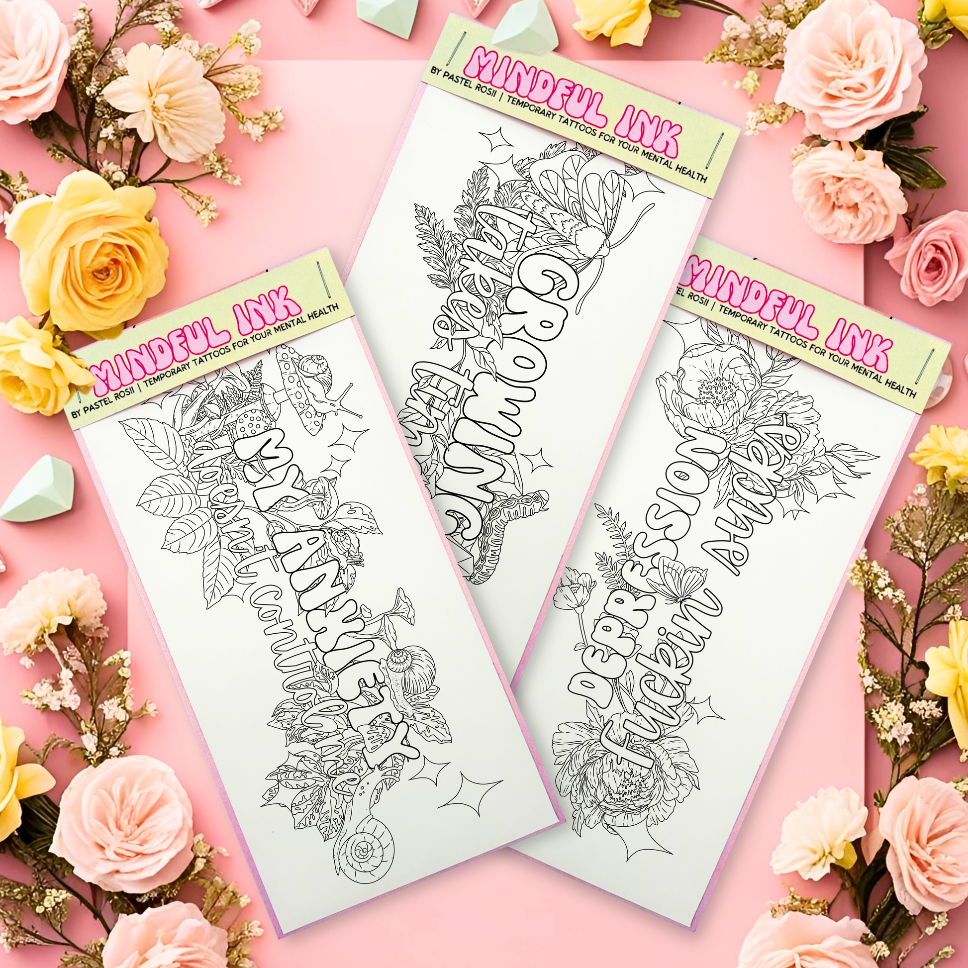 Three coloring tattoo pages with floral and motivational text on a pink background with flowers.