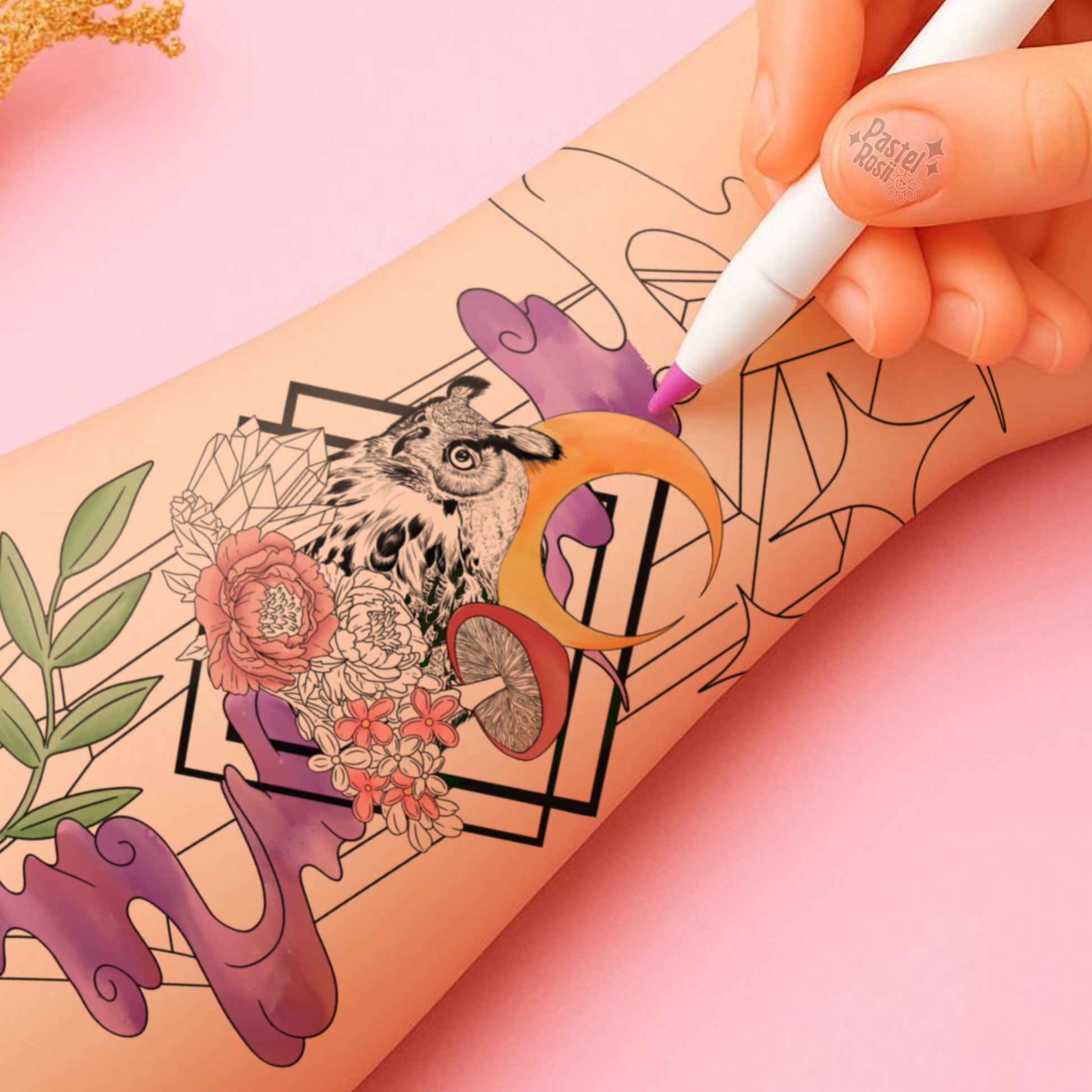 Hand coloring a tattoo design with a marker on a pink background