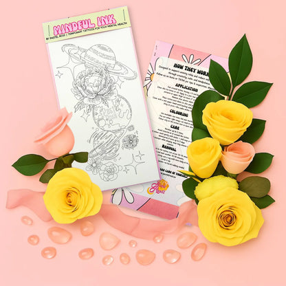 Temporary tattoo with floral designs and yellow roses on a pink background