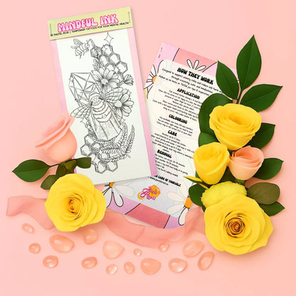 Temporary tattoo with flowers and leaves on a pink background